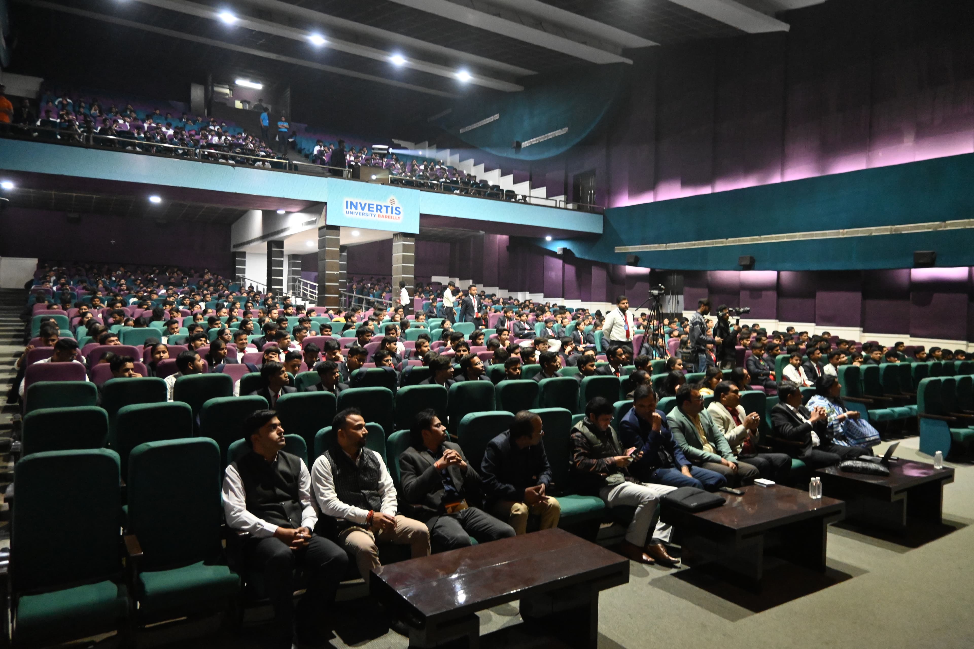 Bitcoin Bharat event taking place in Bareilly, featuring a large audience of over 1,000 attendees gathered for a cryptocurrency-focused conference.